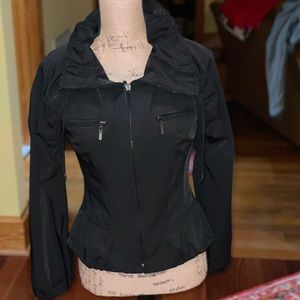 Allura black nylon jacket with zip off sleeves